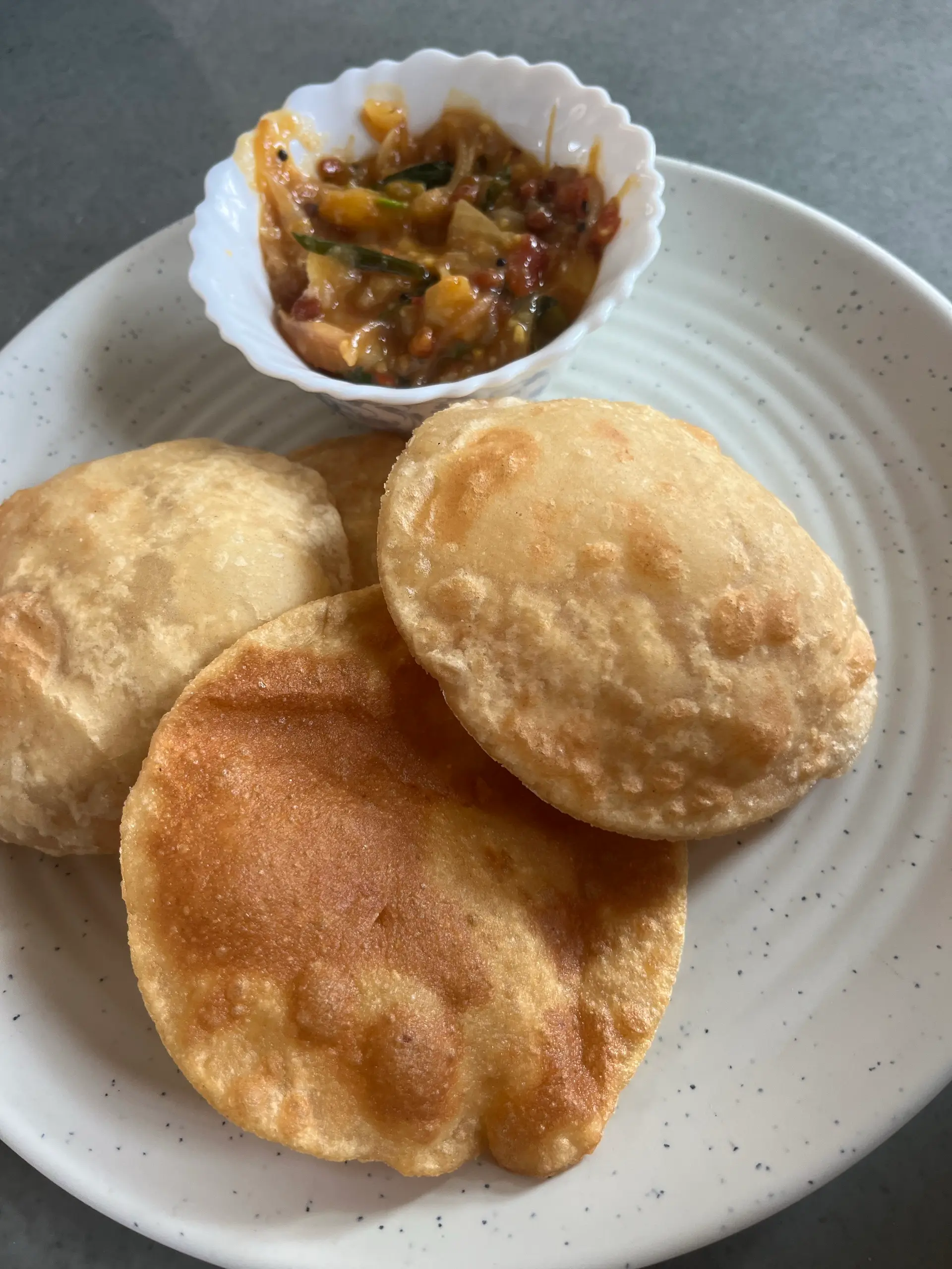 A cook's photo of Poori Masala