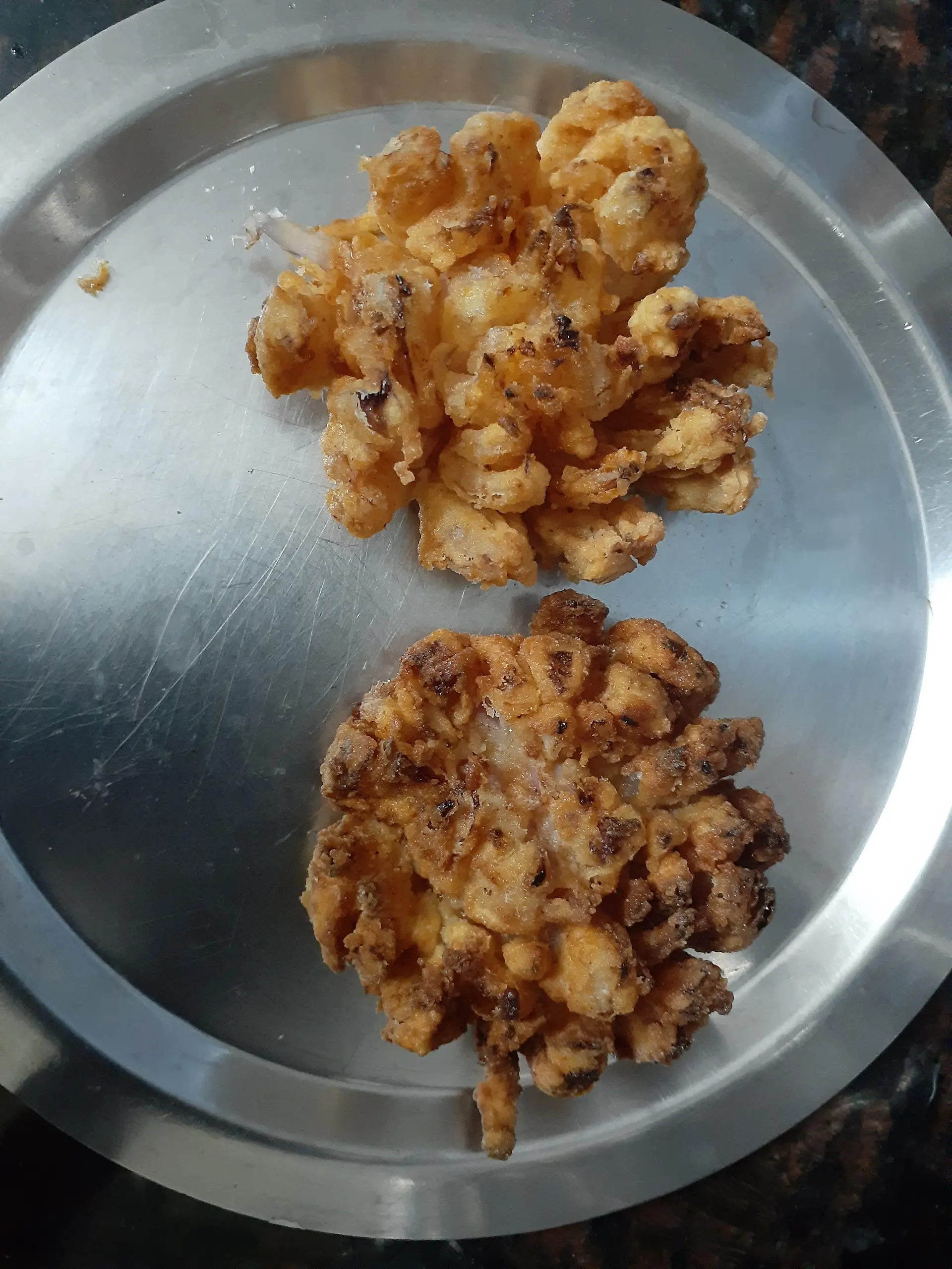 A cook's photo of Blooming Onion