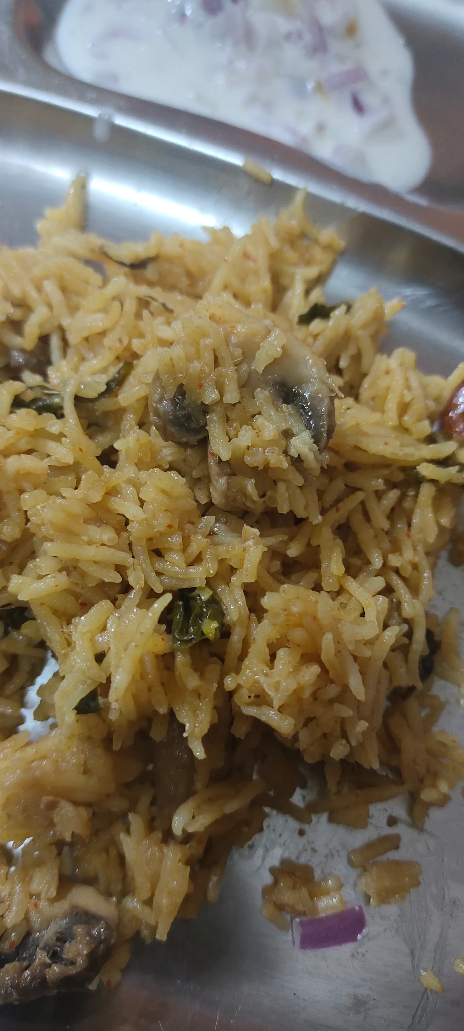 A cook's photo of Mushroom Biryani