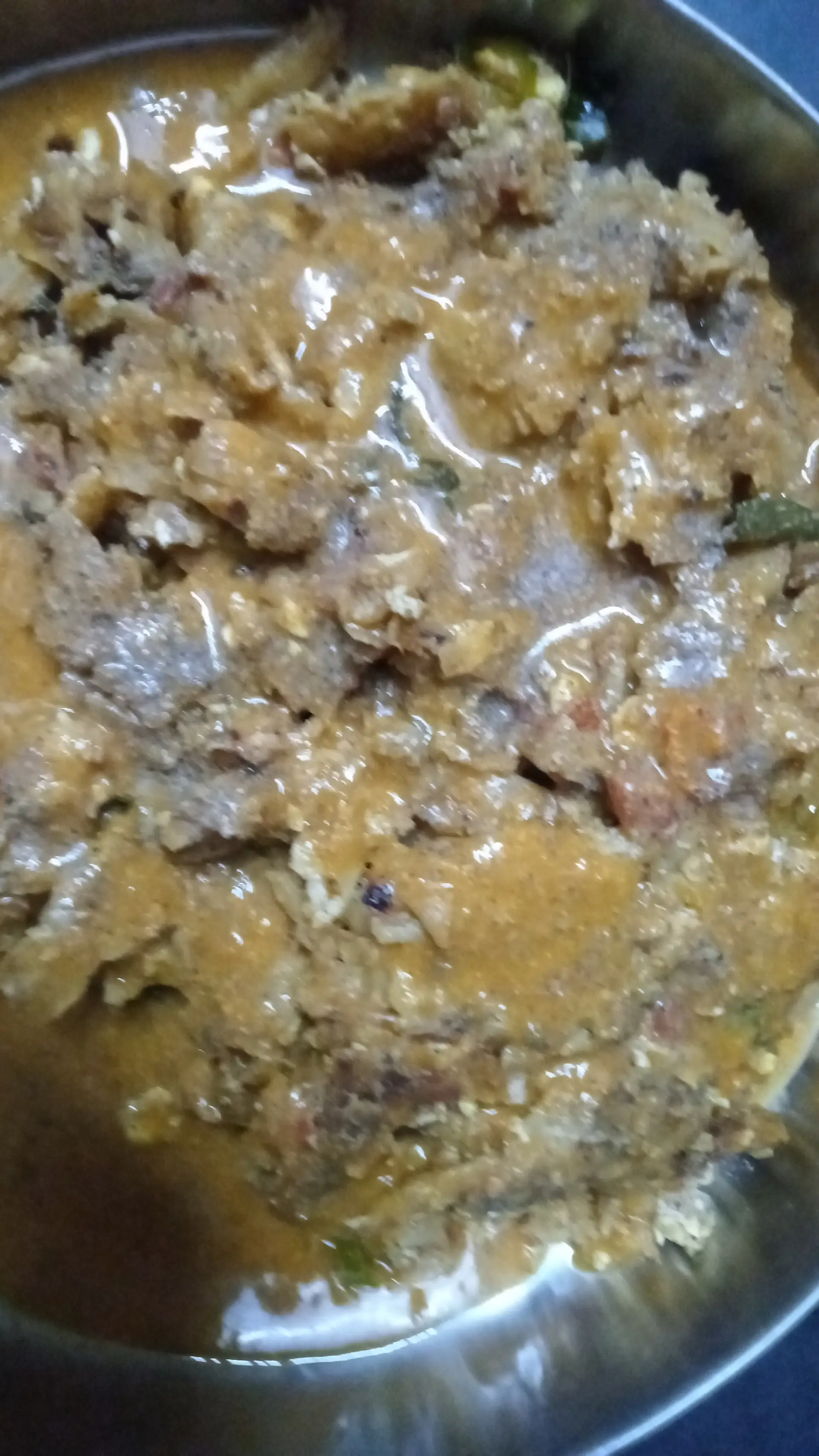 A cook's photo of Kothu Parotta