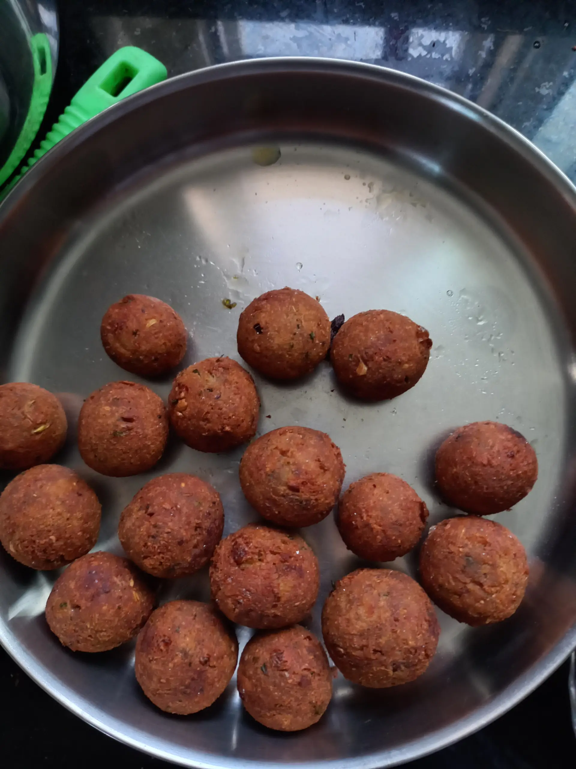 A cook's photo of Vazhakkai Kola Urundai (Raw Banana)