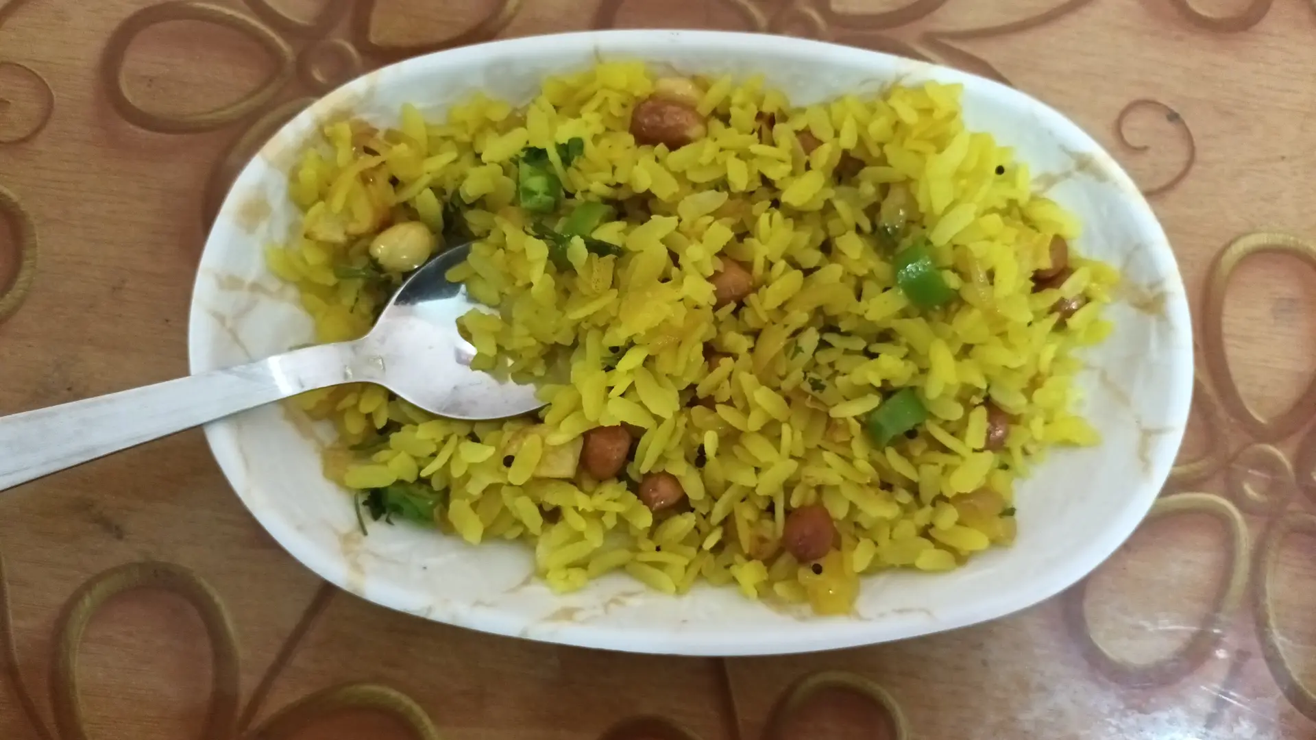 A cook's photo of Poha