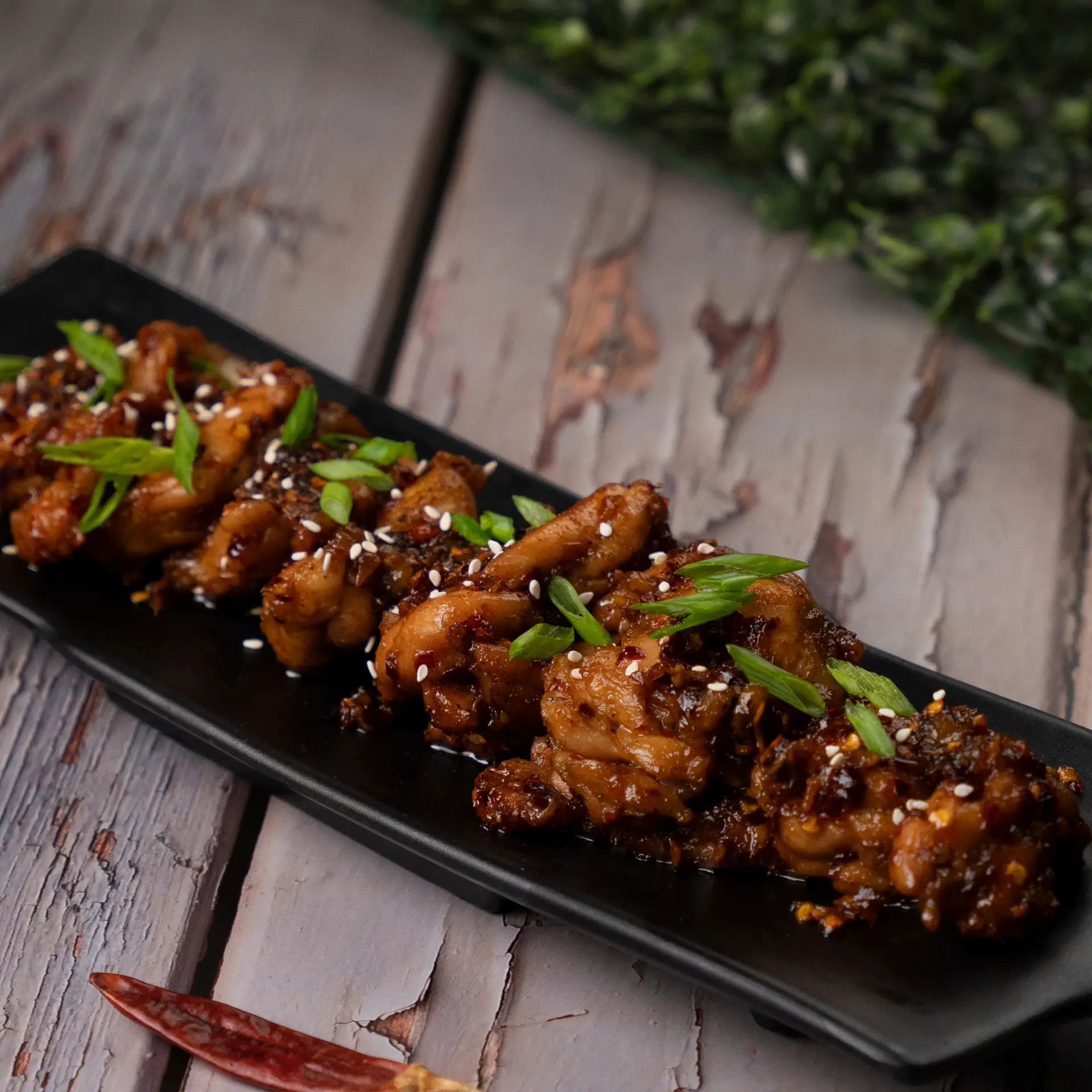 Sweet and Spicy Glazed Sticky Chicken