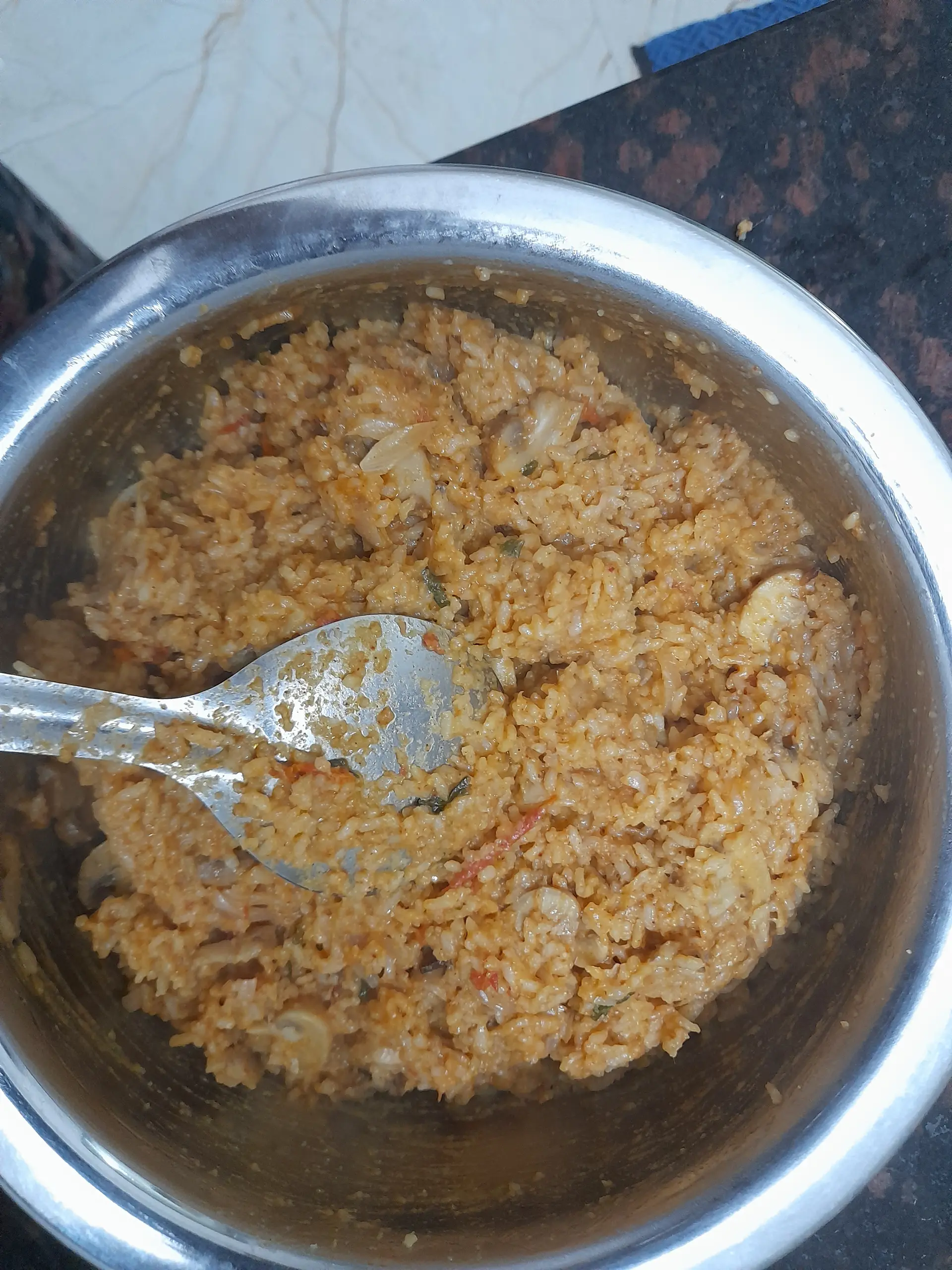 A cook's photo of Mushroom Biryani