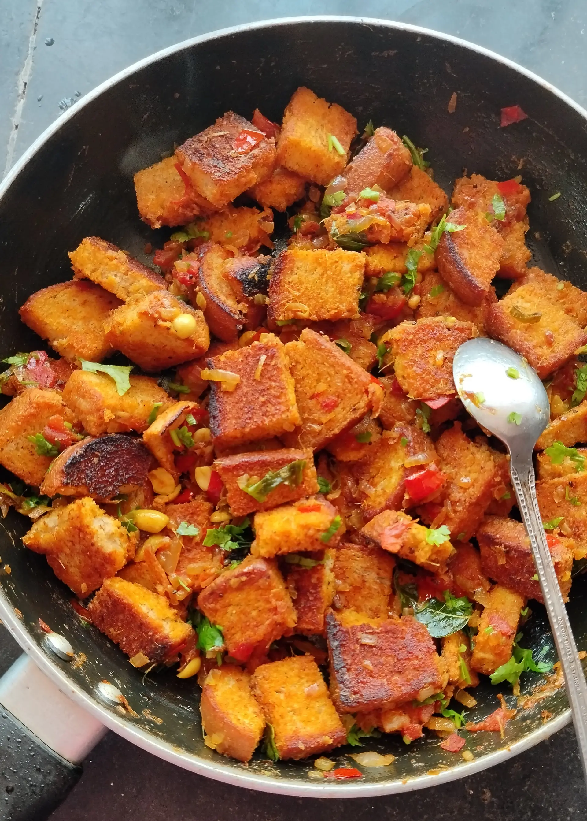 A cook's photo of Bread Upma