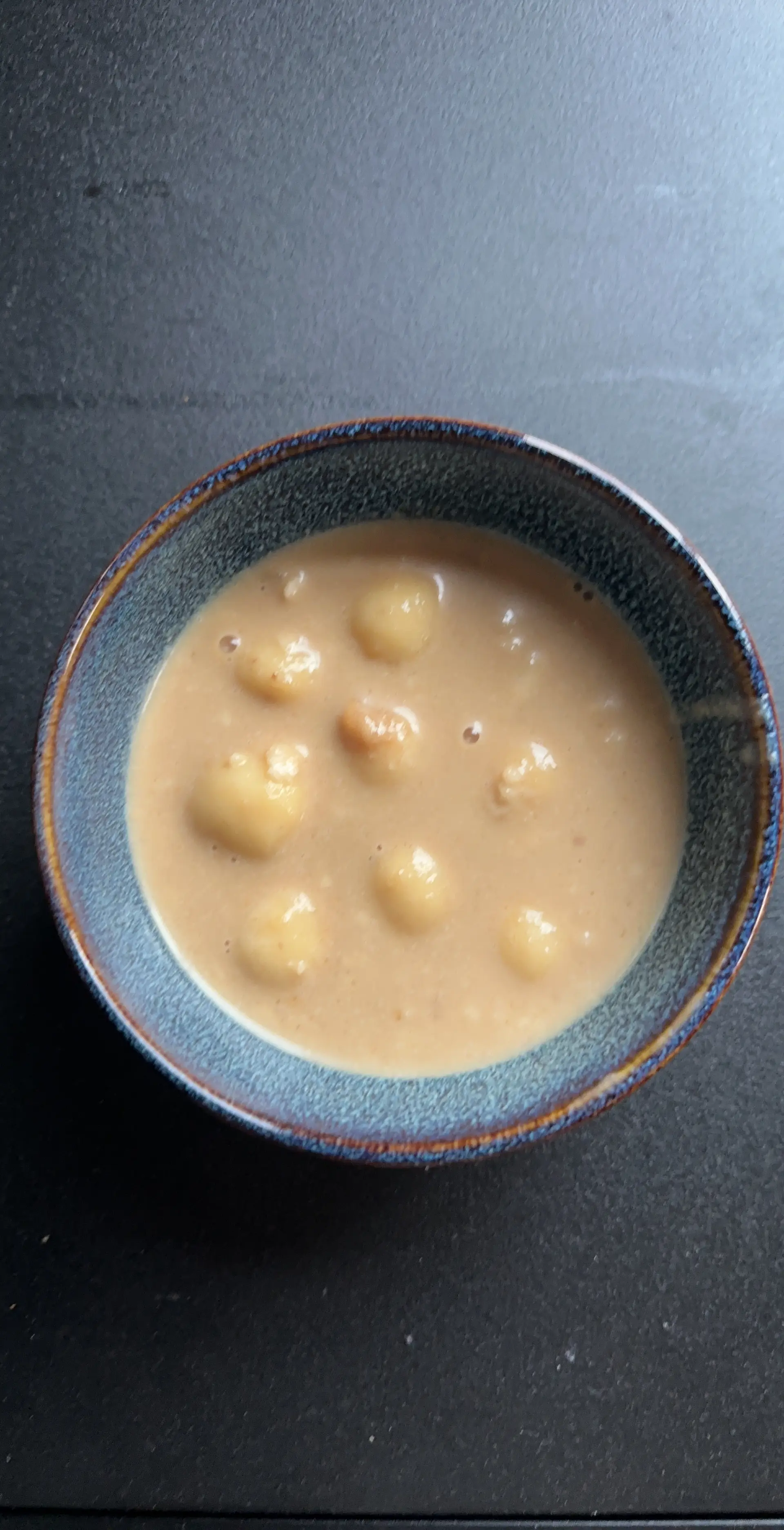 A cook's photo of Paal Kozhukattai
