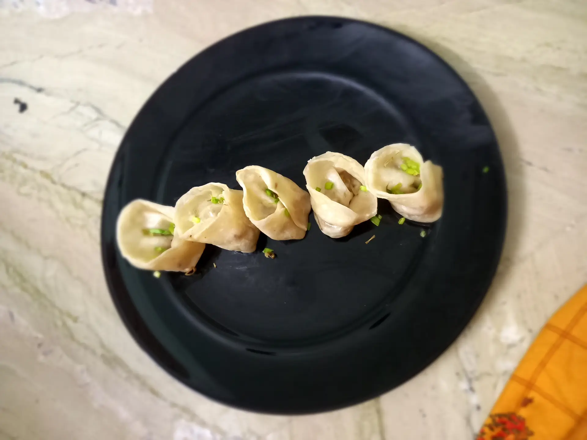 A cook's photo of Veg Momos