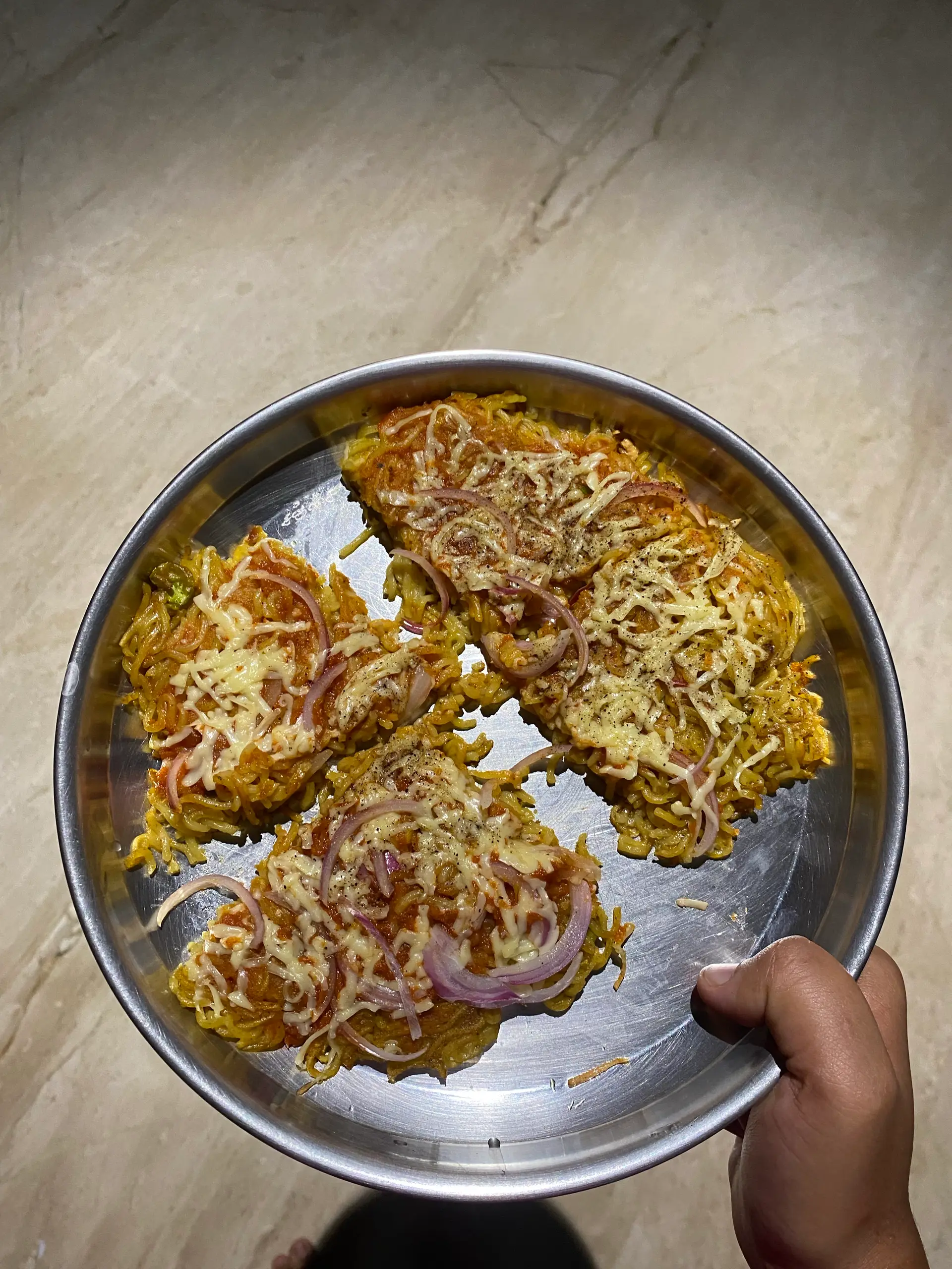 A cook's photo of Maggi Pizza