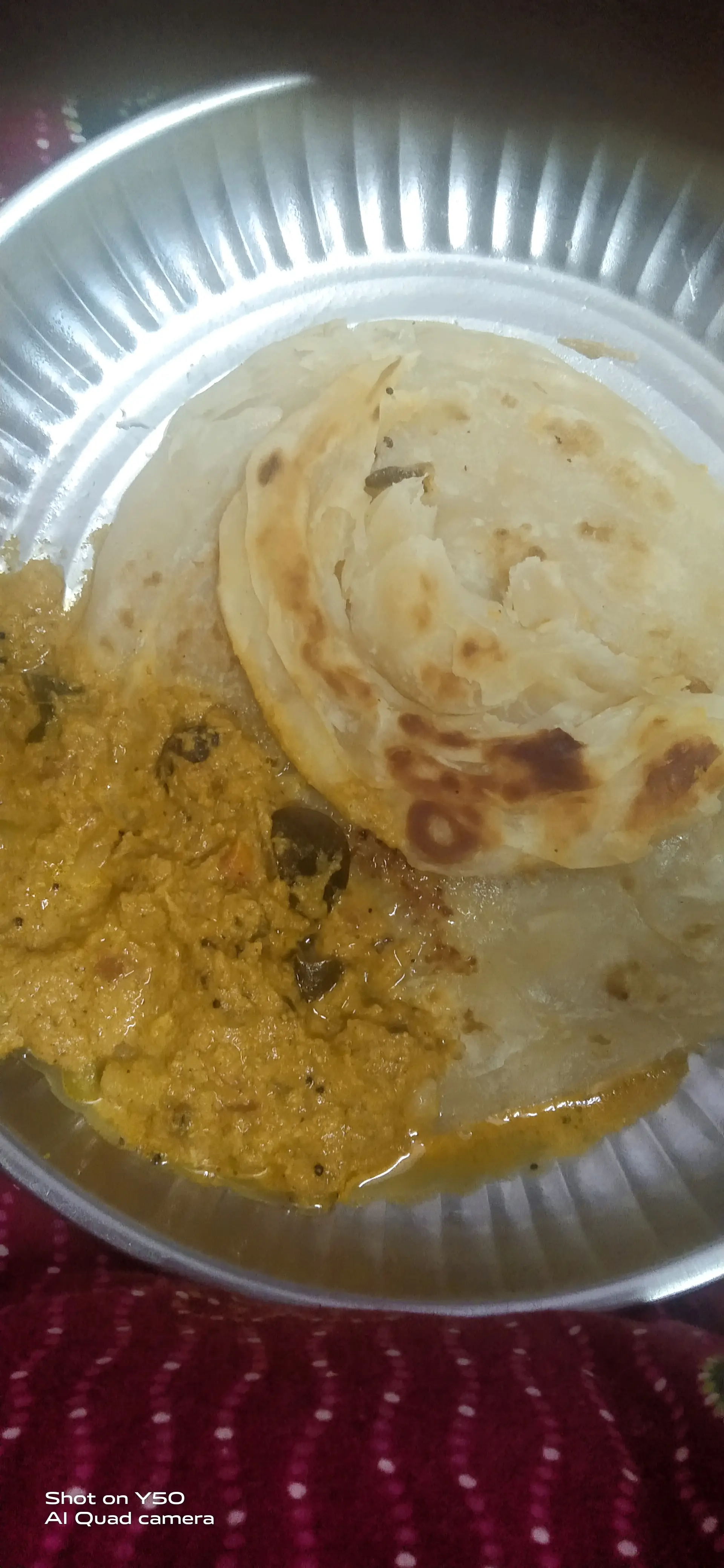 A cook's photo of Parotta